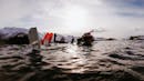 People having fun while snorkeling in cold winter time.