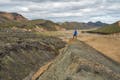 A man looking at the highlands of Iceland