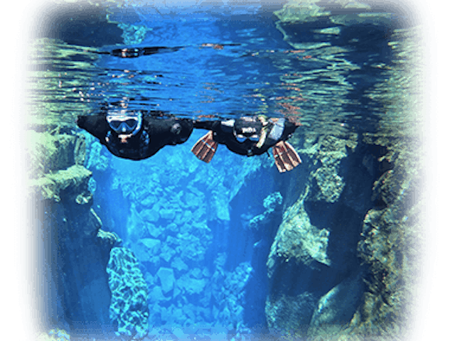 snorkelling in silfra with fading around it